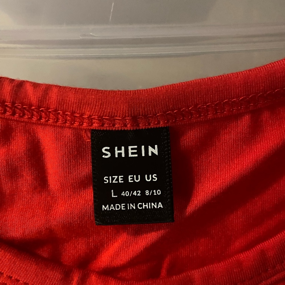 Red crop top.